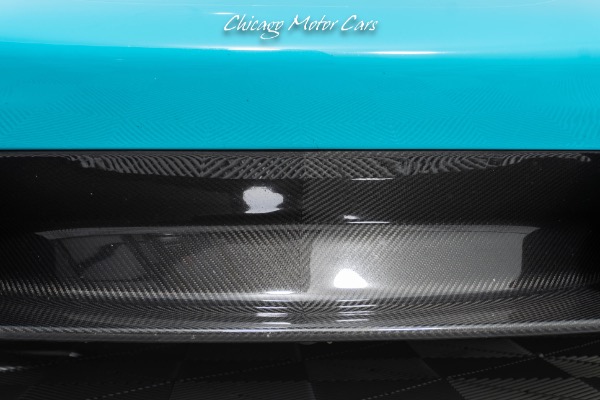 Used-2021-McLaren-765LT-Carbon-Fiber-Exterior-Pack-1---2-Stunning-Tokyo-Cyan-Finish-Stealth-Pack