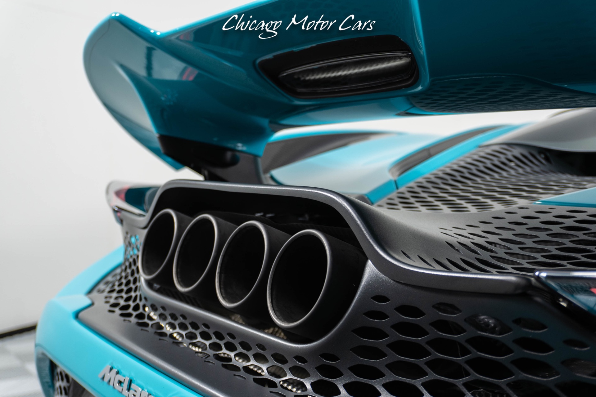 Used-2021-McLaren-765LT-Carbon-Fiber-Exterior-Pack-1---2-Stunning-Tokyo-Cyan-Finish-Stealth-Pack