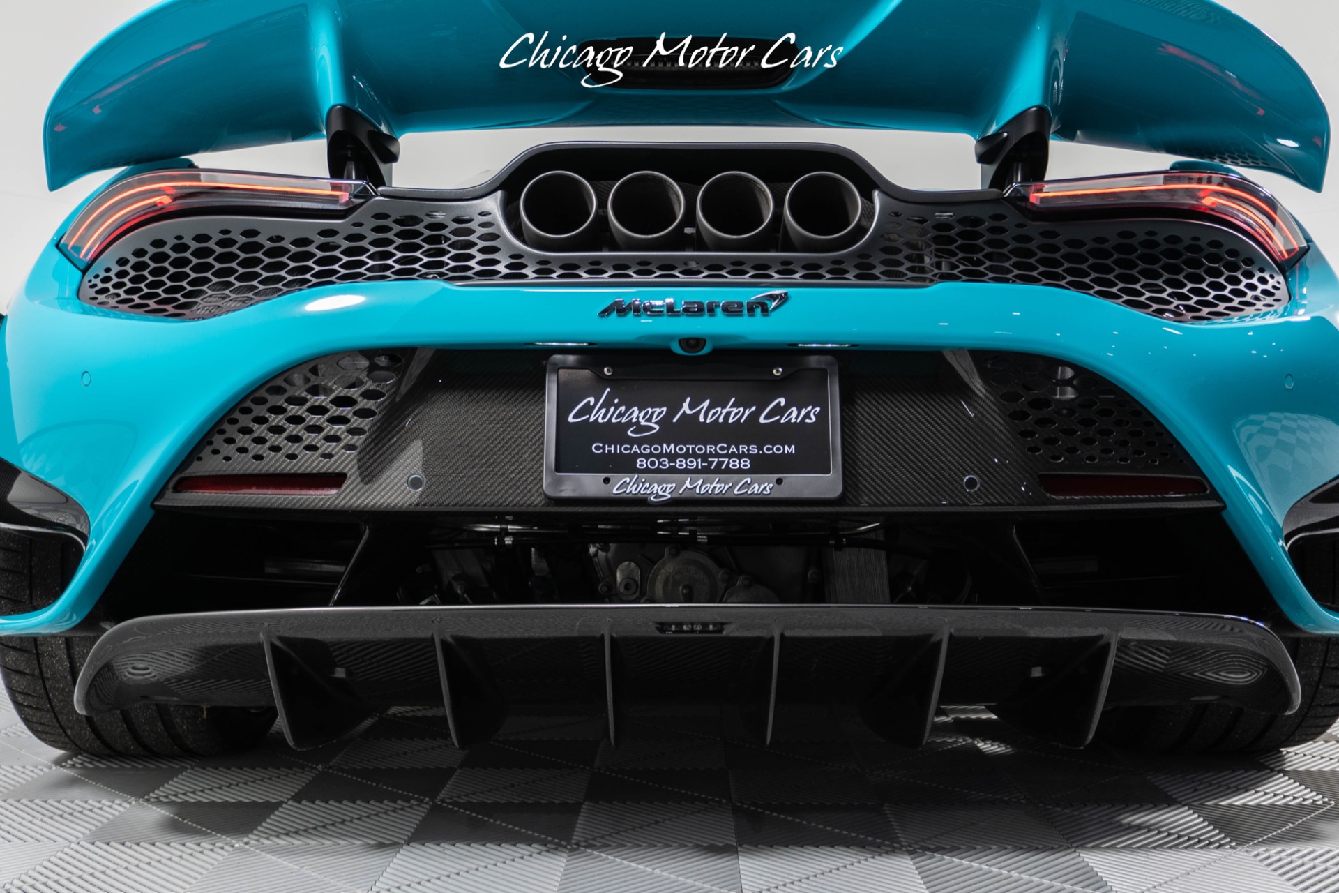 Used-2021-McLaren-765LT-Carbon-Fiber-Exterior-Pack-1---2-Stunning-Tokyo-Cyan-Finish-Stealth-Pack