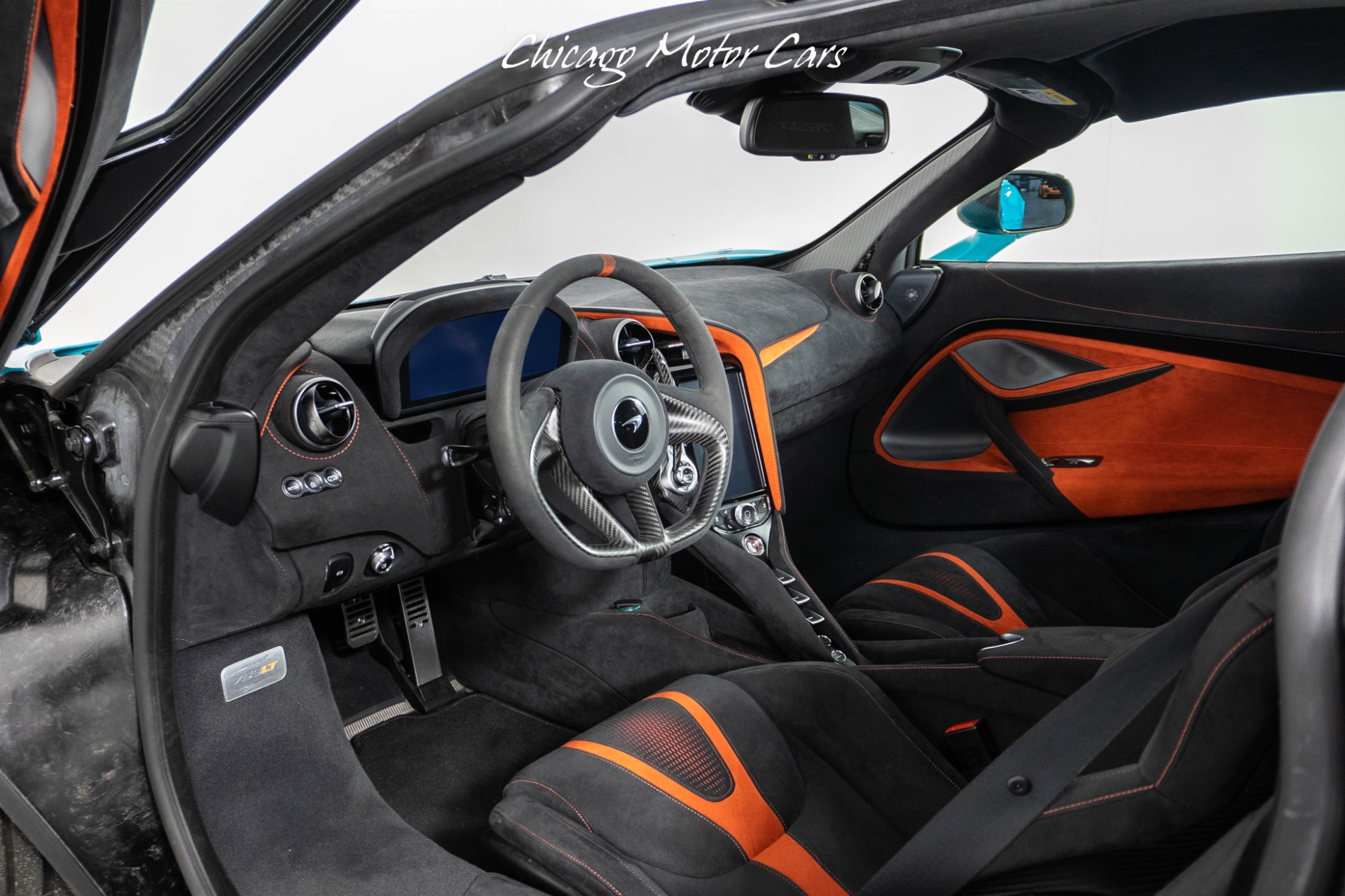 Used-2021-McLaren-765LT-Carbon-Fiber-Exterior-Pack-1---2-Stunning-Tokyo-Cyan-Finish-Stealth-Pack