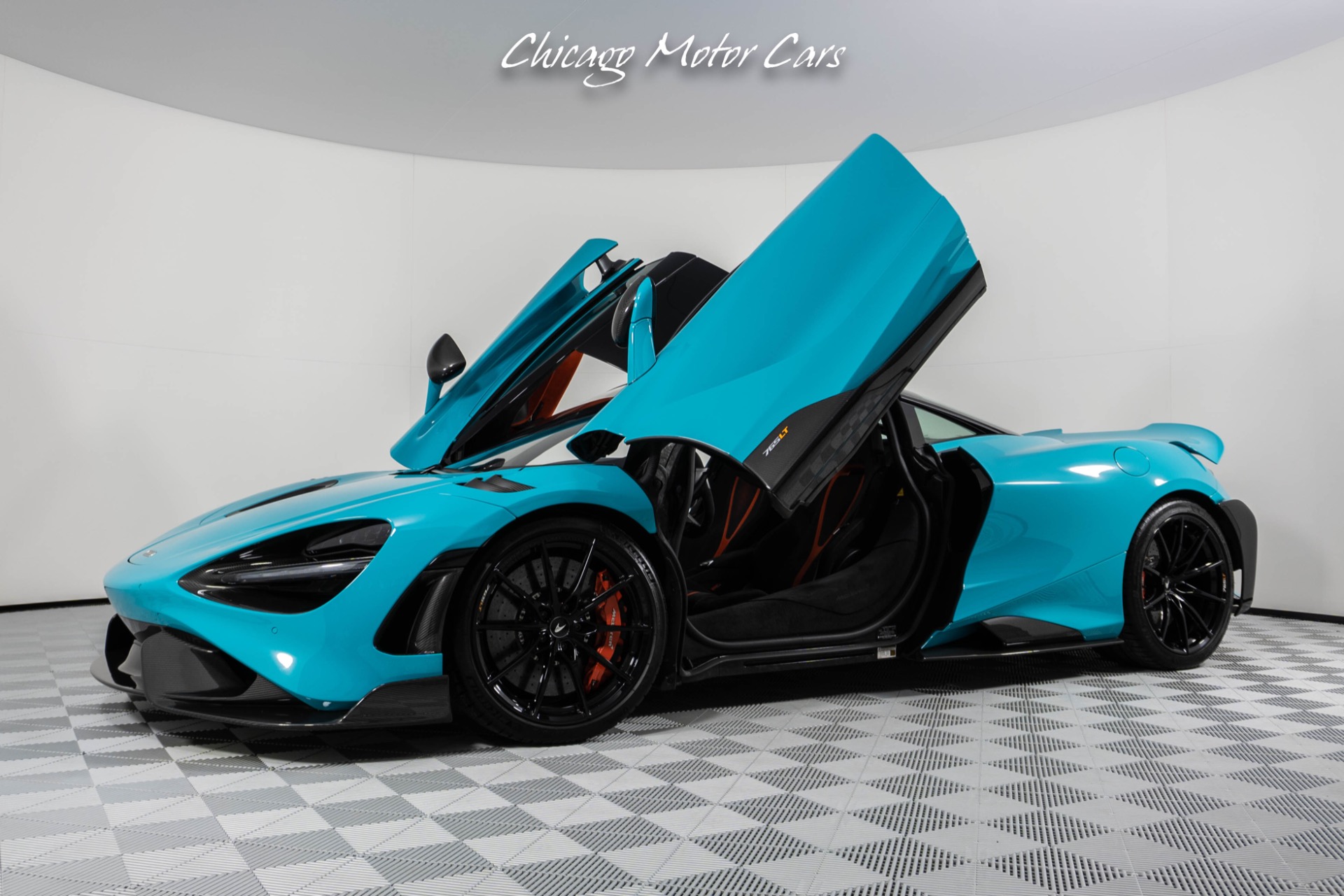 Used-2021-McLaren-765LT-Carbon-Fiber-Exterior-Pack-1---2-Stunning-Tokyo-Cyan-Finish-Stealth-Pack