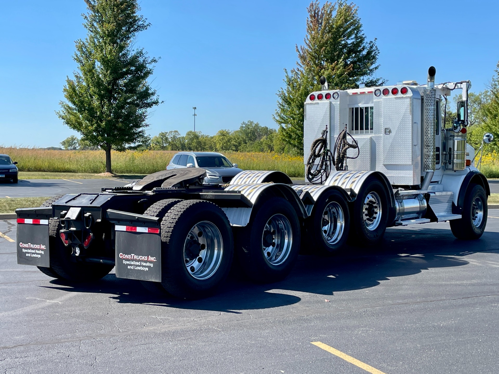 Used 2016 Kenworth T800 QUAD AXLE DAY CAB CUMMINS ISX DUAL LINE WET